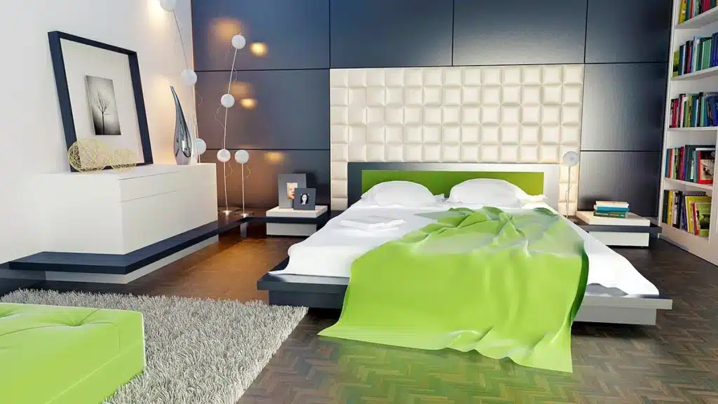 Main de personne réglant le panneau de contrôle d'une climatisation murale dans un appartement moderne et lumineux